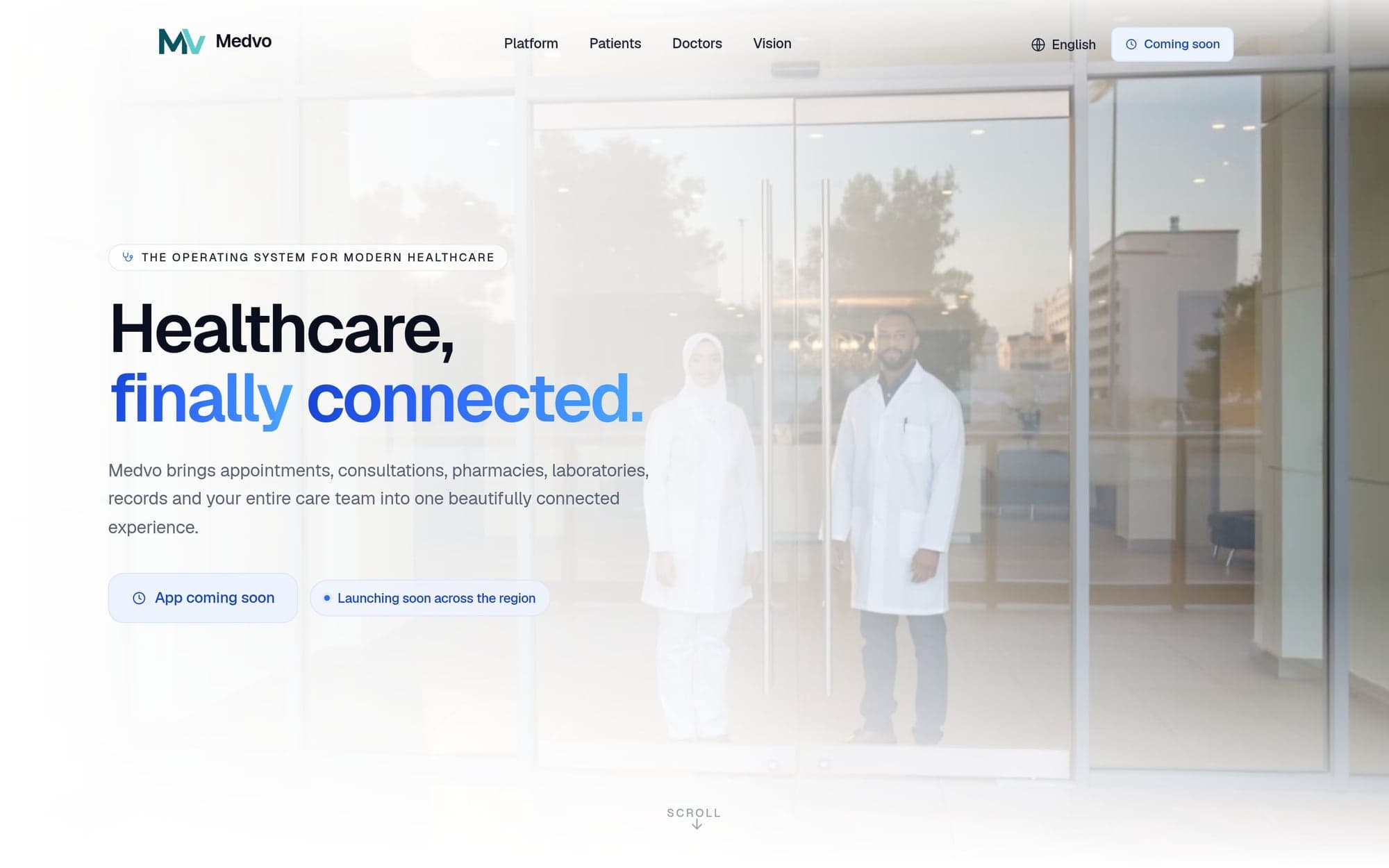 The Medvo launch site’s opening screen: the headline “Healthcare, finally connected.” in navy and blue, beside two doctors in white coats standing at a clinic’s glass doors.